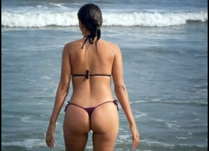 Wife in string bikini